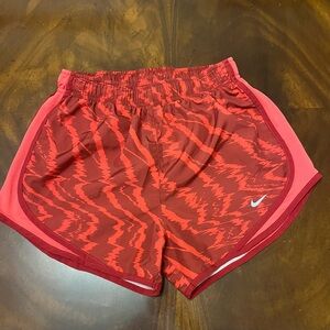 Nike Women's Red Patterned Athletic Shorts with Pink Trim
